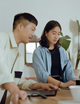 man-and-woman-table-work man and woman working at a table